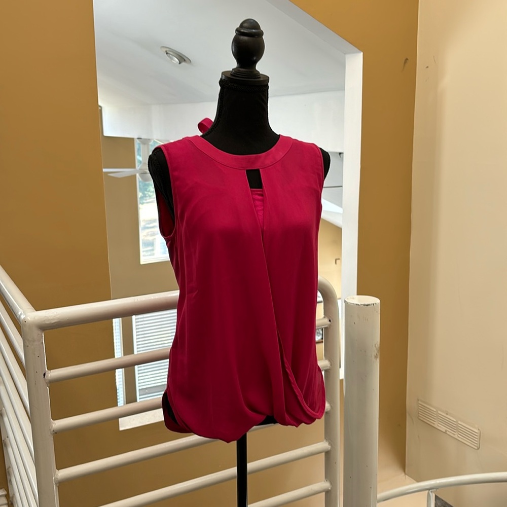 Pink sleeveless blouse